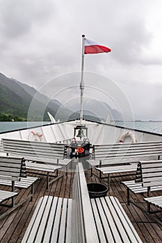 Misty foggy view of alps from a cruise ride on Lake Brienz, Interlaken, Switzerland