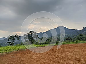 Misty Hills and Verdant Mountain Range in West Java photo