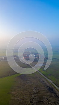 Misty Morning Ascend Over Sleepy Countryside Hamlet