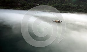 Misty morning fishing boat