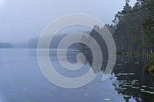 Misty morning lake landscape view in Finland