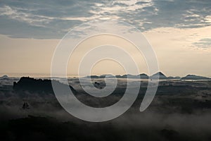 Misty morning in the mountains, Landscape view of Khao Na Nai Luang temple on peak mountain at Surat Thani Province, Southern of T