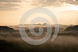 Misty morning in the mountains, Landscape view of Khao Na Nai Luang temple on peak mountain at Surat Thani Province, Southern of T