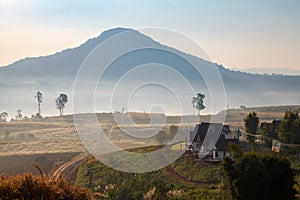 Misty morning sunrise and house in Khao Takhian Ngo View Point a