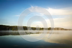 Misty morning on Uby lake, France