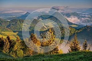 Misty morning with view of Trzy Korony Three Crowns peak in Pieniny National Park