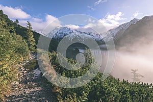 Misty morning view in wet mountain area in slovakian tatra. tour