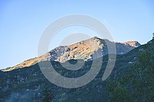 Misty morning view in wet mountain area in slovakian tatra - vintage film look