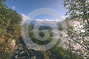 Misty morning view in wet mountain area in slovakian tatra - vintage film look