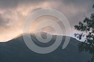 Misty morning view in wet mountain area in slovakian tatra - vintage film look