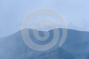 Misty morning view in wet mountain area in slovakian tatra