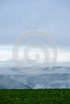 Misty morning view in wet mountain area in slovakian tatra