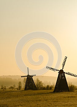 Misty morning view of the windmill on the prairie