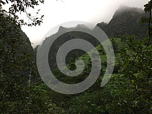 Misty Mountain Cliffs near Hanakapiai Falls along NaPali Coast on Kauai Island, Hawaii.