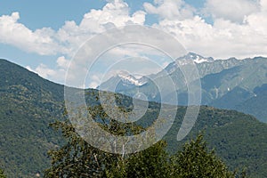 Misty mountain landscape with fir forest. Beautiful landscape with mountain view, cable car. Postcard view