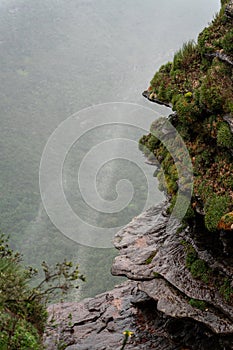 Misty Mountain Waterfall Edge with Windswept Spray