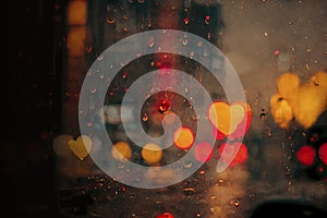 Misty night window with rain drops blurred background, night light city view window AI Generated