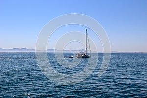 Misty Ocean Landscape with yacht boat