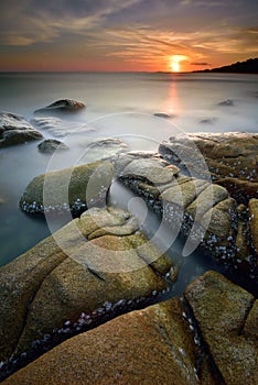 Misty seascape at sunset