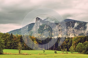 Misty summer mountain hills landscape. Filtered image:cross proc