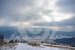 Misty winter morning in mountain village