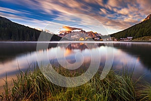 Misurina Lake, on Dolomites (Italian Alps) seen at sunrise. Sorapiss mountain in the background. South Tyrol, Dolomites, Italy.