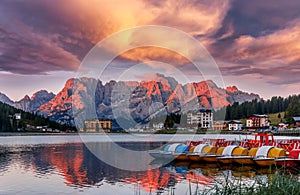 Misurina Lake in the Dolomites mountains in Italy near Auronzo di Cadore during sunset. Fantastic Sunrise over Misurina Lake with