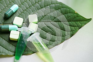 Mitragyna speciosa korth kratom drug plant with pills in labor