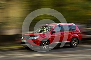 Mitsubishi red car.