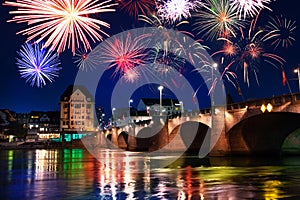 Mittlere Brucke across Rhine river at night, Basel photo