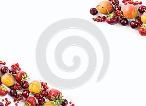 Mix berries isolated on a white. Ripe apricots, red currants, cherries and strawberries. Berries and fruits with copy space for te