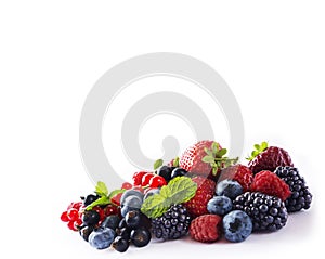 Mix berries isolated on a white. Ripe blueberries, blackberries, red currants, black currant, raspberries and strawberries. Variou