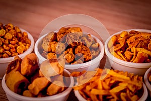 Mix chavad namkeen with chana dal on wooden table