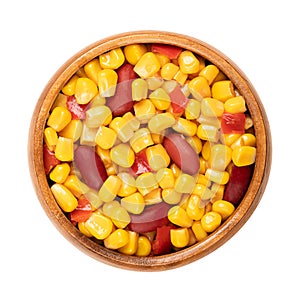 Mix of canned corn, kidney beans and diced bell pepper, in wooden bowl