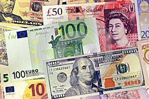 Mix of currencies banknotes - Dollar, Pound Sterling, Euro