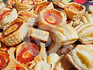 Mix of delicious appetizers and small pizzas made of puff pastry