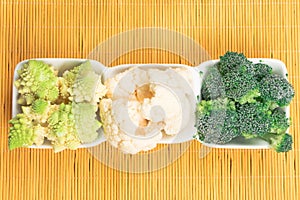 mix of diffenent cabbage on straw mat