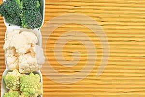 mix of diffenent cabbage on straw mat