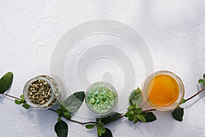 Mix of different salt types on grey concrete background, copy space