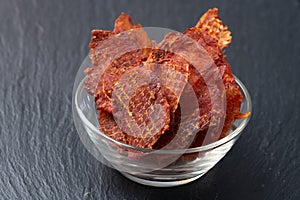 Mix of dried meat Jerky . From chicken , beef and pork