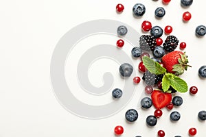 Mix fresh berries on white background, top view