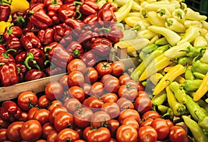 Mix of fresh tomato, peppers and paprika on the farm market. Natural local products on the farm market.