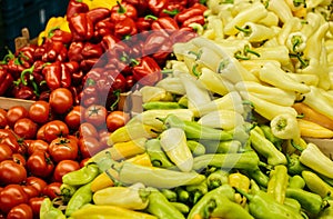 Mix of fresh tomato, peppers and paprika on the farm market. Natural local products on the farm market.