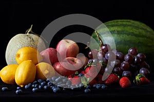 Mix fruit isolated with black background