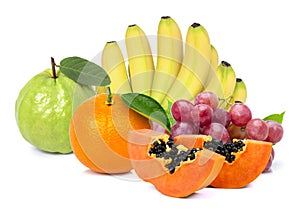 Mix  fruit, Pile of different types of fresh organic fruits  yellow ripe banana, red grape,  orange fruit, papaya and guava with