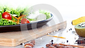 Mix fruit and vegetable ,Healthy eating mix of fresh vegetables salad topped on wooden table