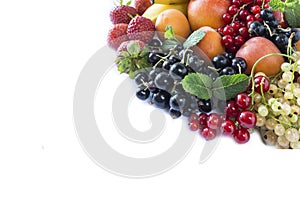 Mix fruits berries on white background. Ripe black, red, white currants, strawberries and apricots. Sweet and juicy fruits with co