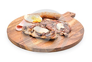 mix grilled steak on wood plate