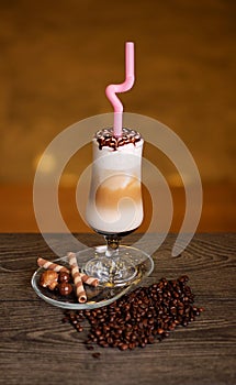 Mix ice cream and coffee and milk with chocolate and biscuit