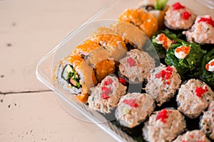 Mix japanese sushi rolls in take away package